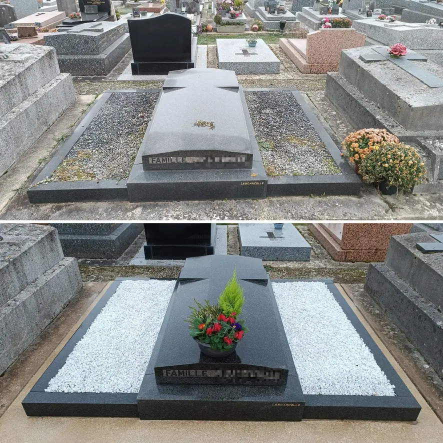 Tombe rectangulaire en pierre sombre dans un cimetière, entourée de gravats et d'autres monuments. Déco fleurie au centre avec un petit arrangement végétal coloré, et un lit de gravier blanc sur les côtés. Tombe rectangulaire en pierre sombre dans un cimetière, entourée de gravats et d'autres monuments. Déco fleurie au centre avec un petit arrangement végétal coloré, et un lit de gravier blanc sur les côtés.